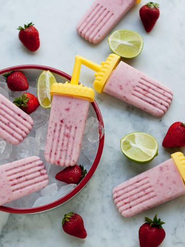 Strawberry Coconut Lime Popsicles. A healthy refreshing treat to cool you down on a hot summer day | www.PineappleandCoconut.com