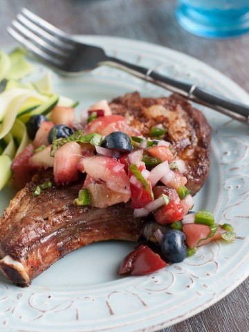 Perfectly Grilled Pork Chops With Blueberry Peach Basil Salsa www.pineappleandcoconut.com