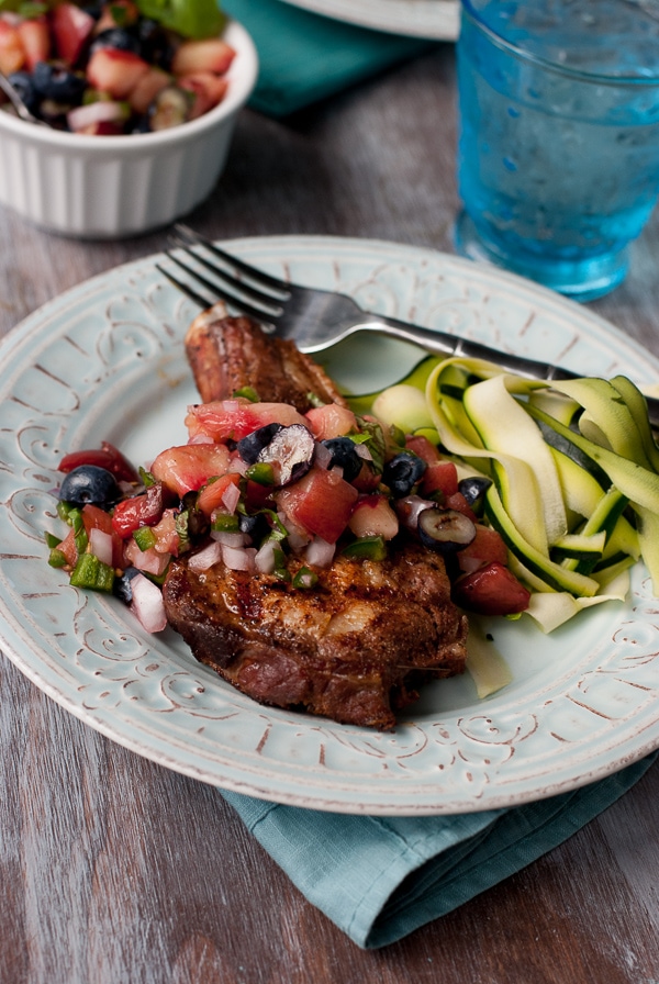 Perfectly Grilled Pork Chops with Blueberry Peach Basil Salsa www.pineappleandcoconut.com