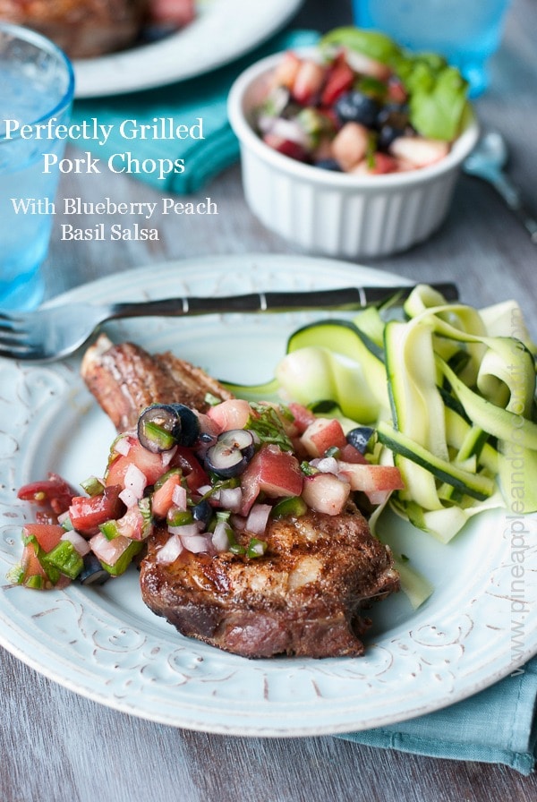  Perfectly Grilled Pork Chops With Blueberry Peach Basil Salsa www.pineappleandcoconut.com