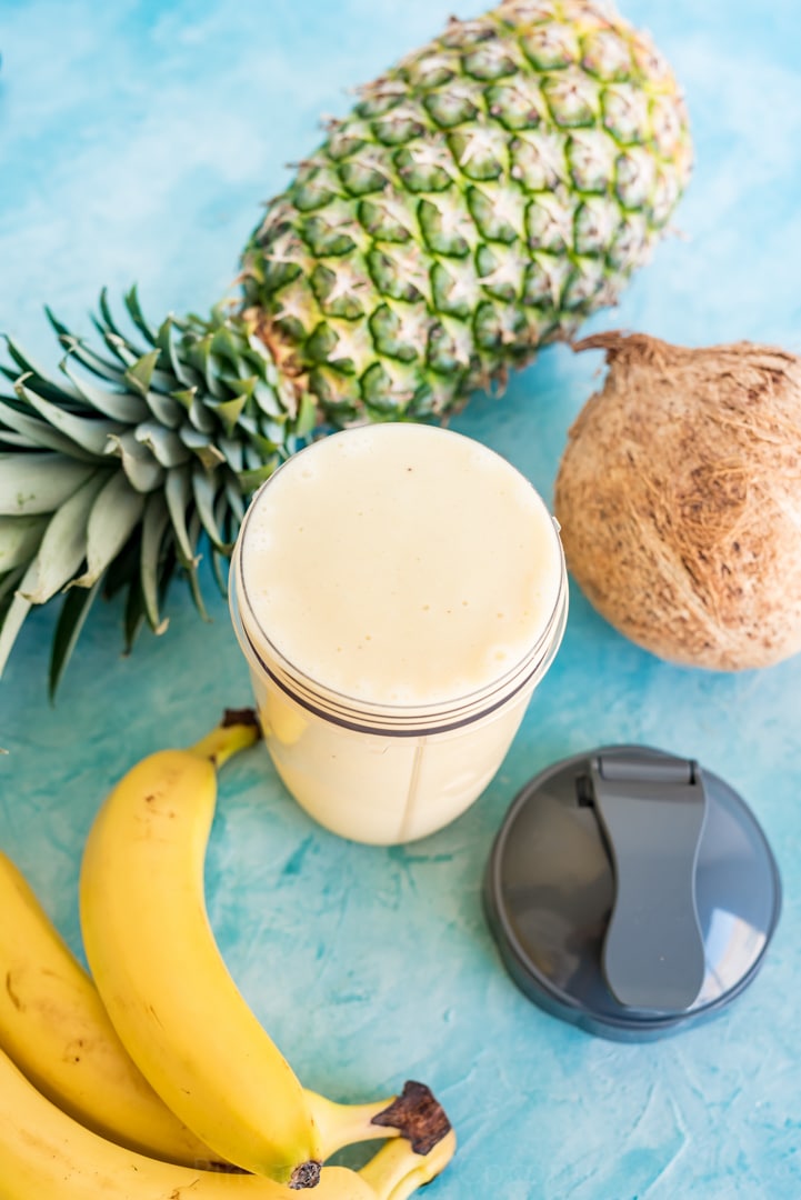 High Protein Banana Colada Smoothie #nutribulletuniversity #ad www.pineappleandcoconut.com