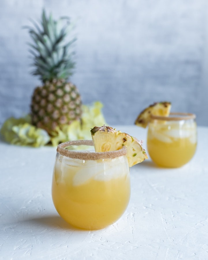 Spiced Pineapple Rum Punch www.pineappleandcoconut.com #drinkmas