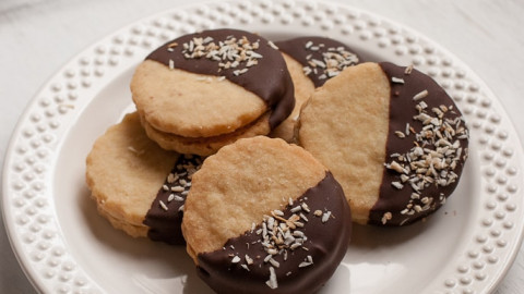 Chocolate Dipped Caramel Cream Filled Coconut Shortbread Sandwich Cookies