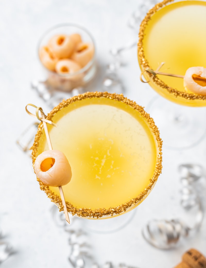 New Year’s Golden Tiki Cocktail ( Gold Rum Lychee Champagne Cocktail) www.pineappleandcoconut.com