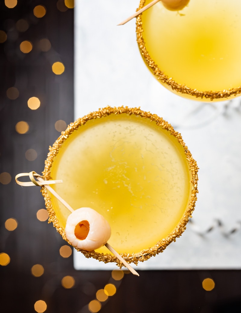 New Year’s Golden Tiki Cocktail ( Gold Rum Lychee Champagne Cocktail) www.pineappleandcoconut.com