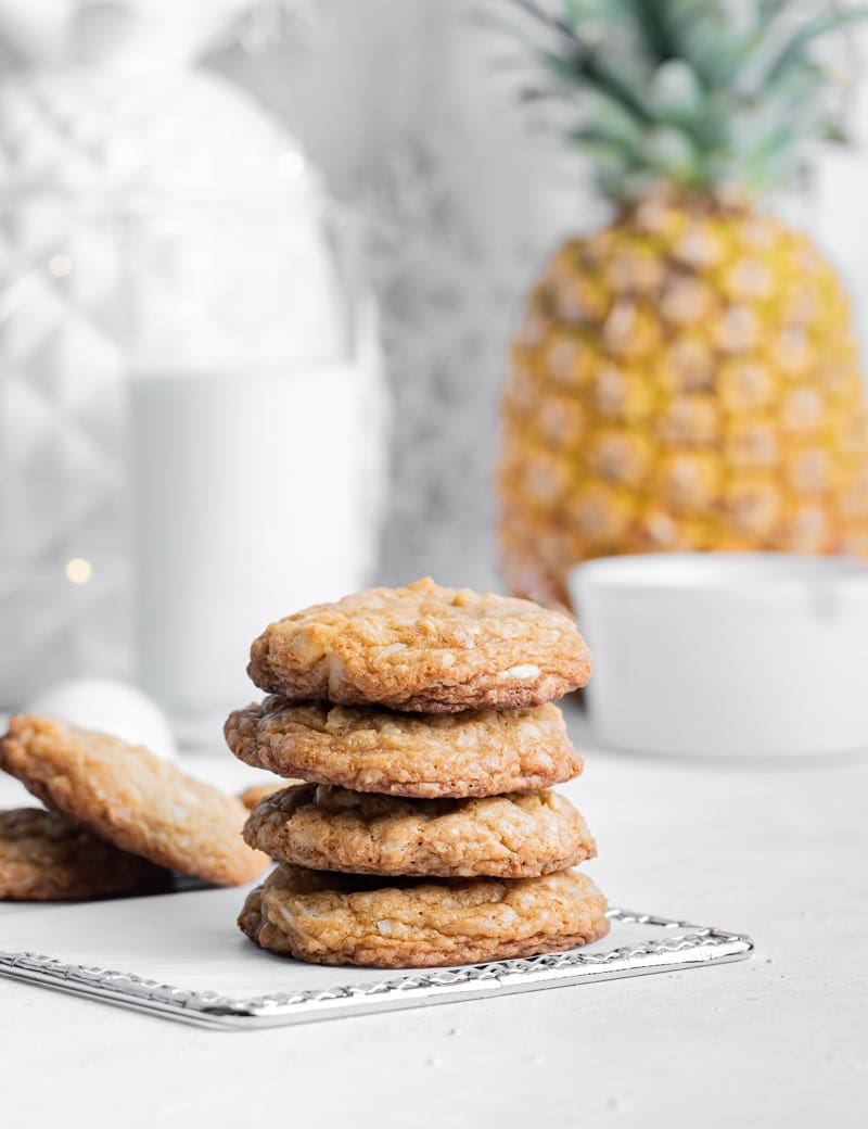 Piña Colada cookies bring a tropical flavor to your cookie tray this holiday season. www.pineappleandcoconut.com