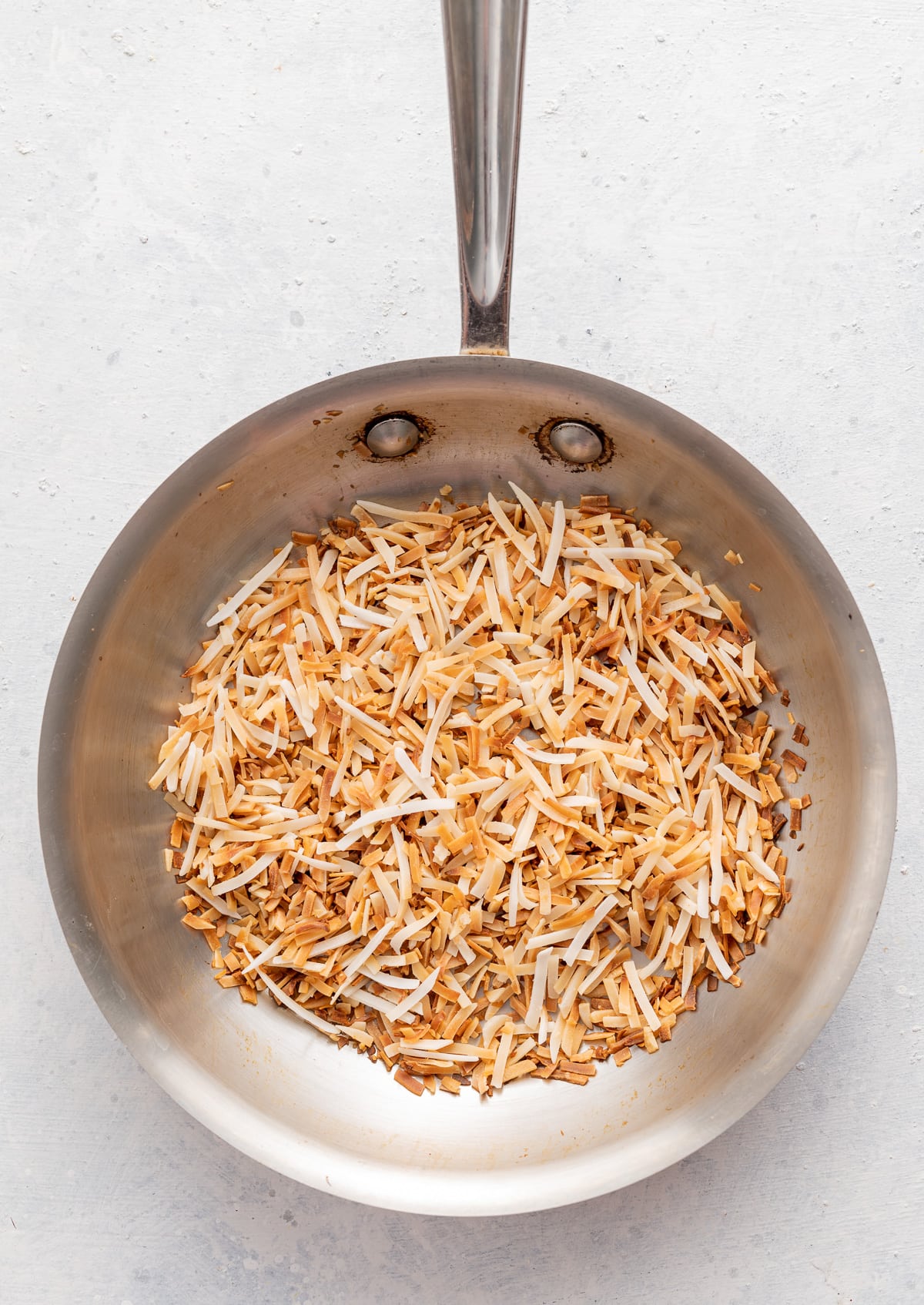 pan of shredded toasted coconut