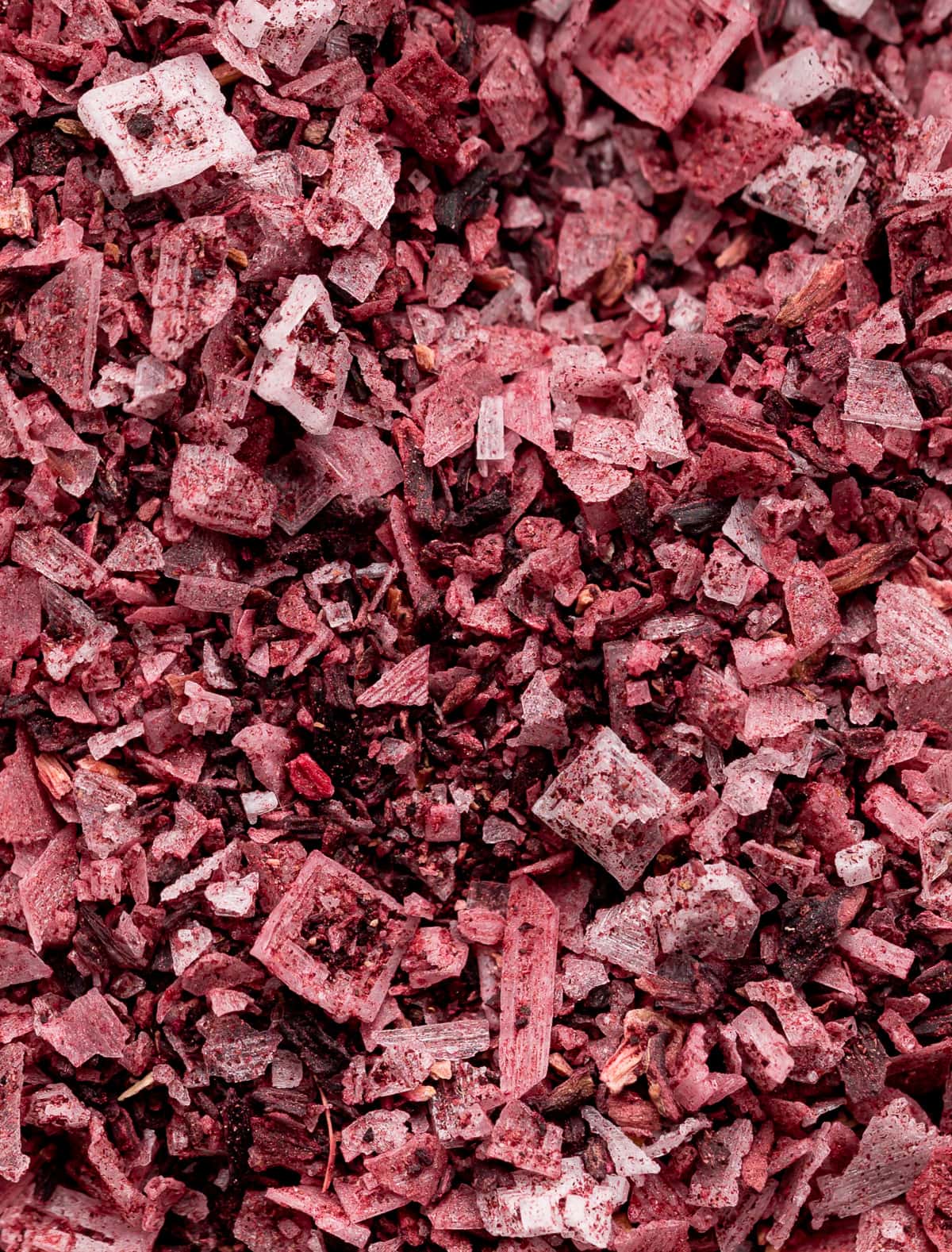 large maldon sea salt flakes mixed with powdered red hibiscus flowers