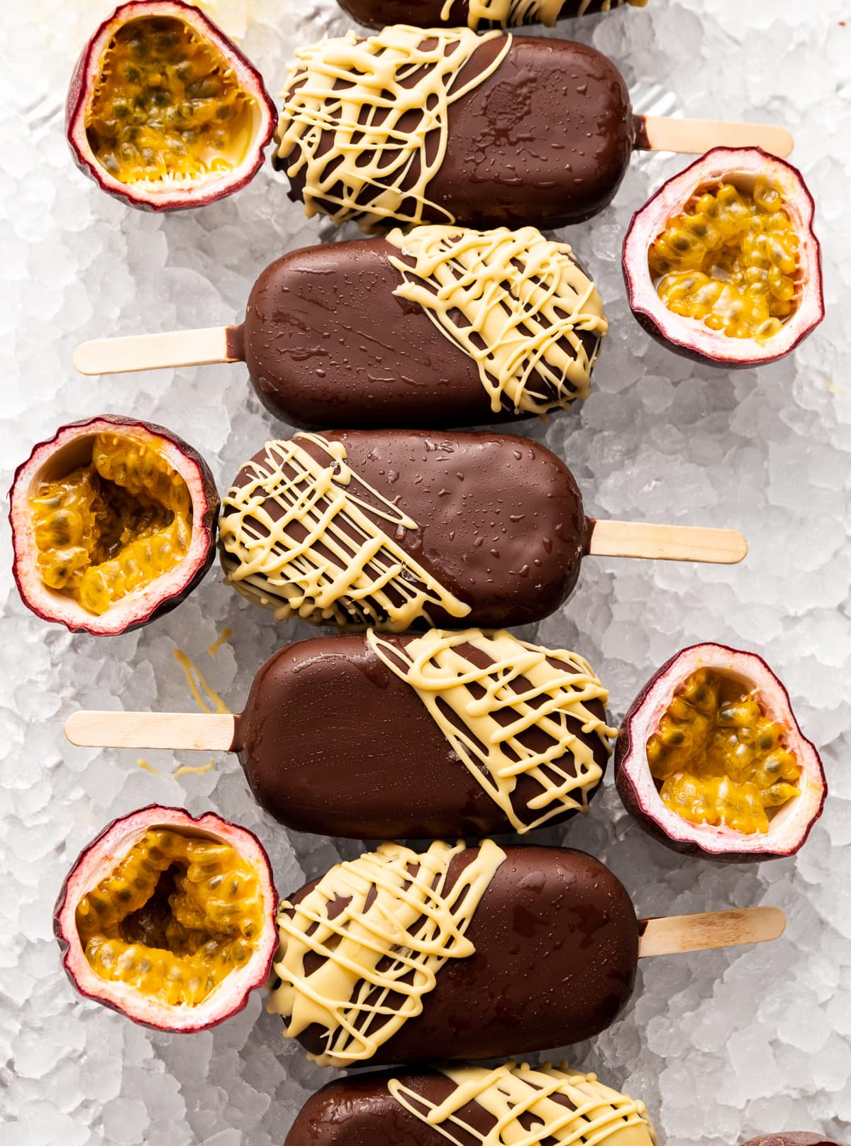 chocolate covered ice cream pops fresh passion fruits cut in half