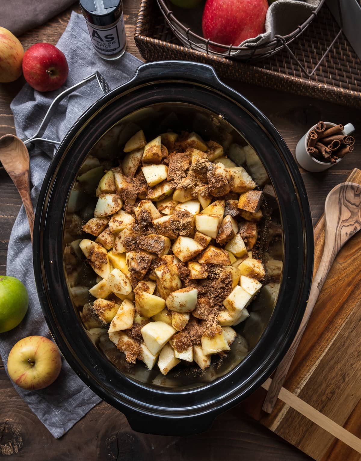 diced apples with spices in a slow cooker