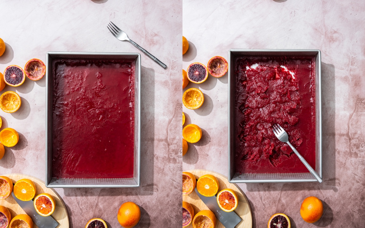 pan full of semi frozen dark red blood orange juice with a fork