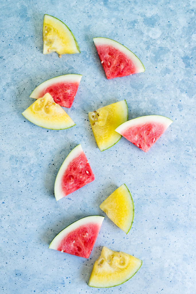 slices of red and yellow watermelon