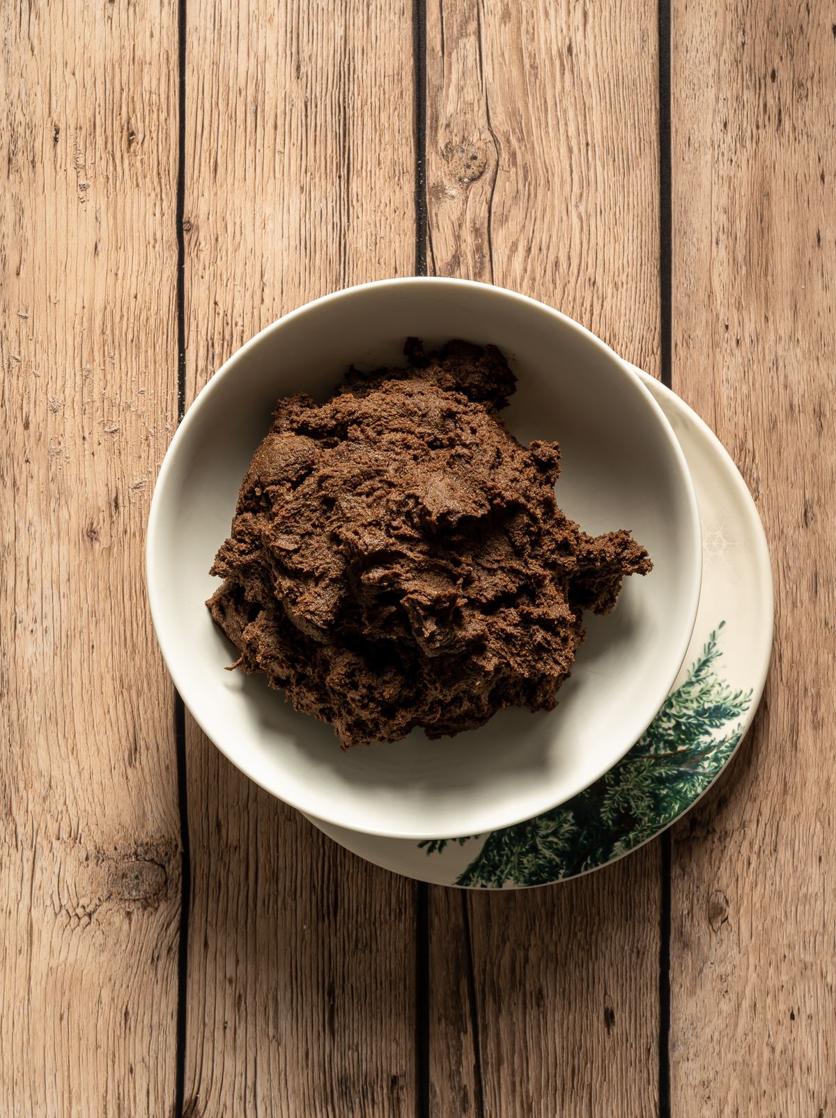 bowl of chocolate gingerbread cookie dough