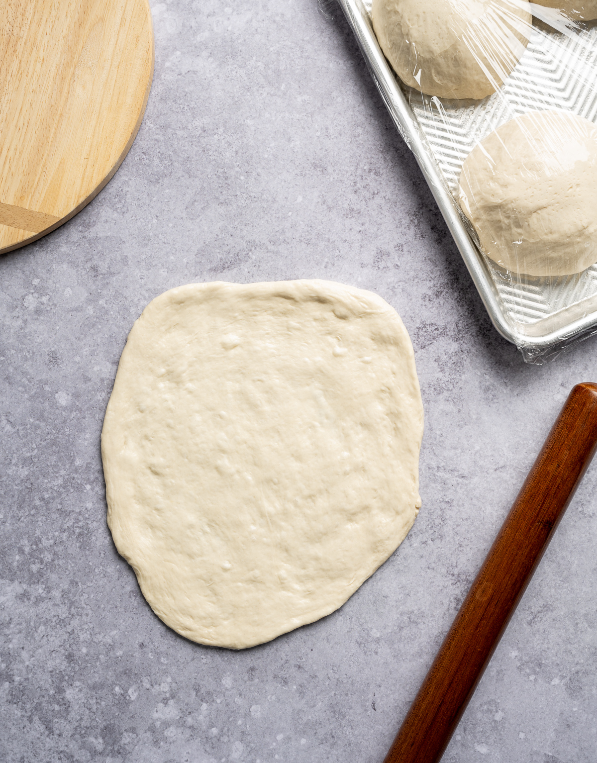 rolled out pizza dough