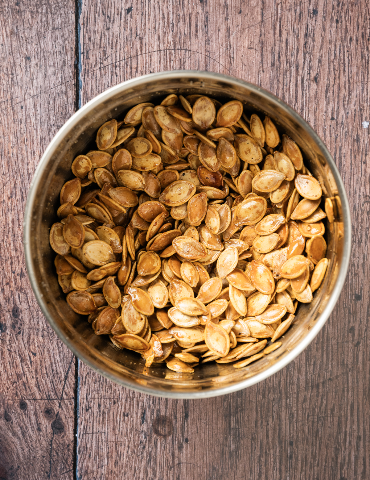 bowl of roasted pumpkin seeds with soy and honey