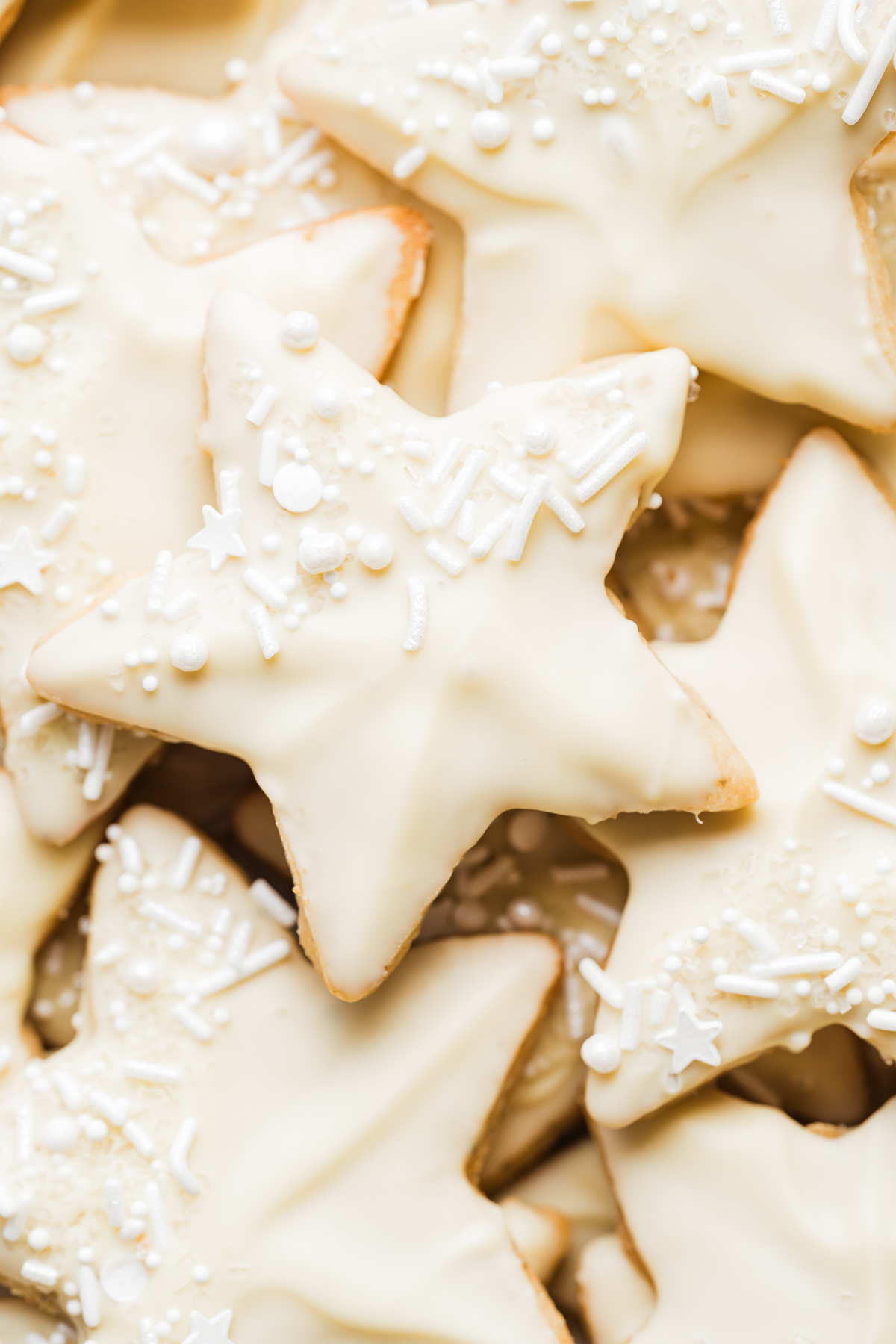 star shaped white chocolate dipped cardamom shortbread cookies 