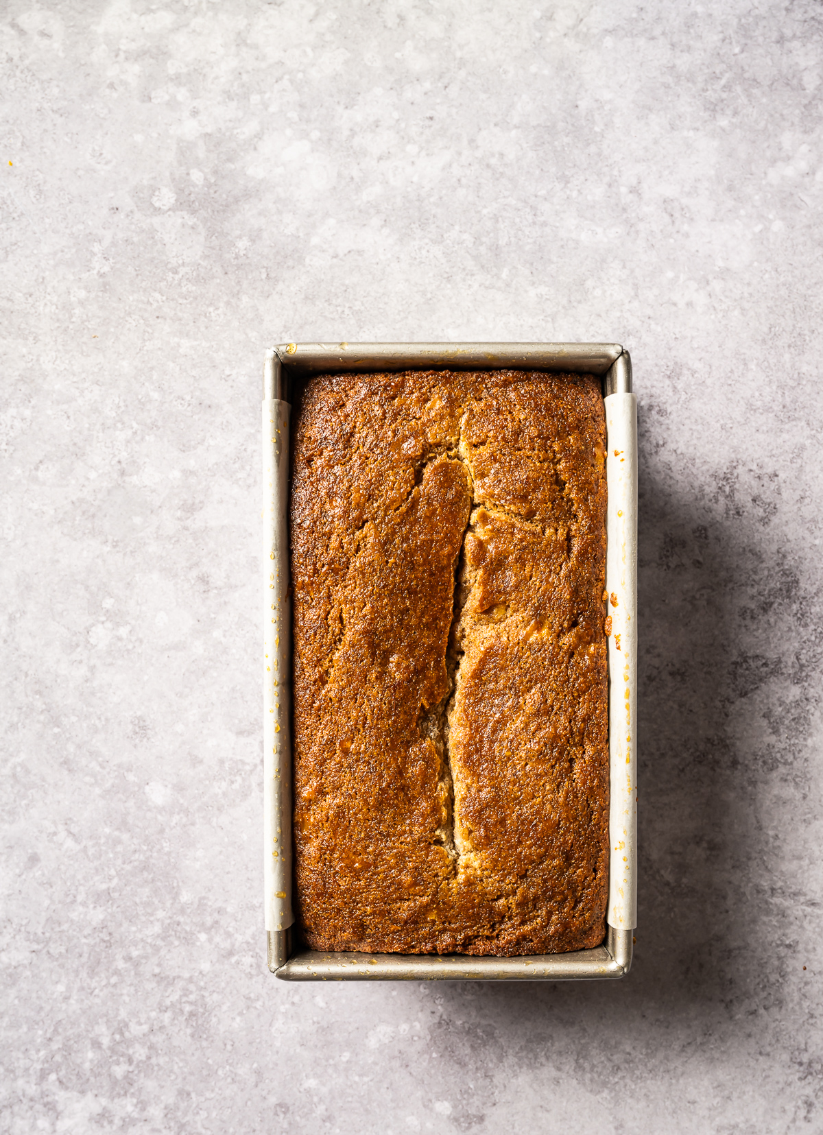 baked banana bread in loaf tin