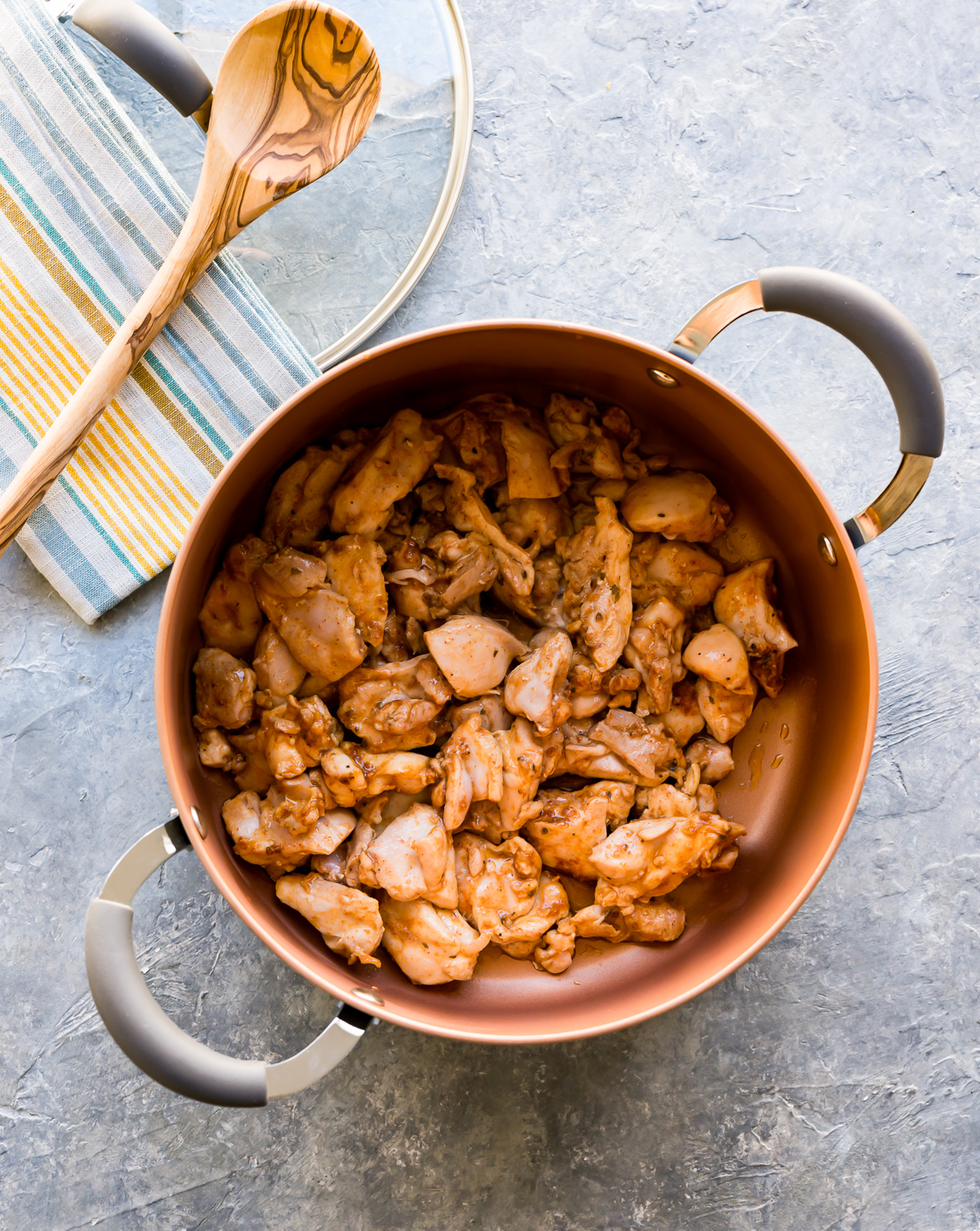 sauteed chicken pieces in pot